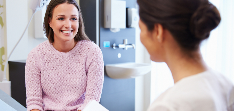 Woman patient and healthcare provider talking